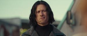 Movie review: 'Hit Man' showcases Glen Powell's many talents