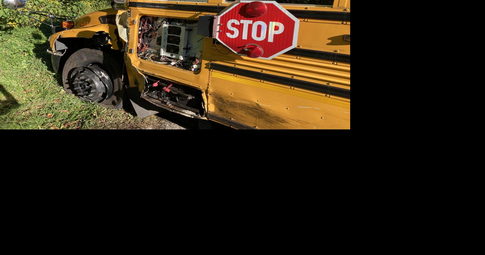 SUV collides head-on with school bus