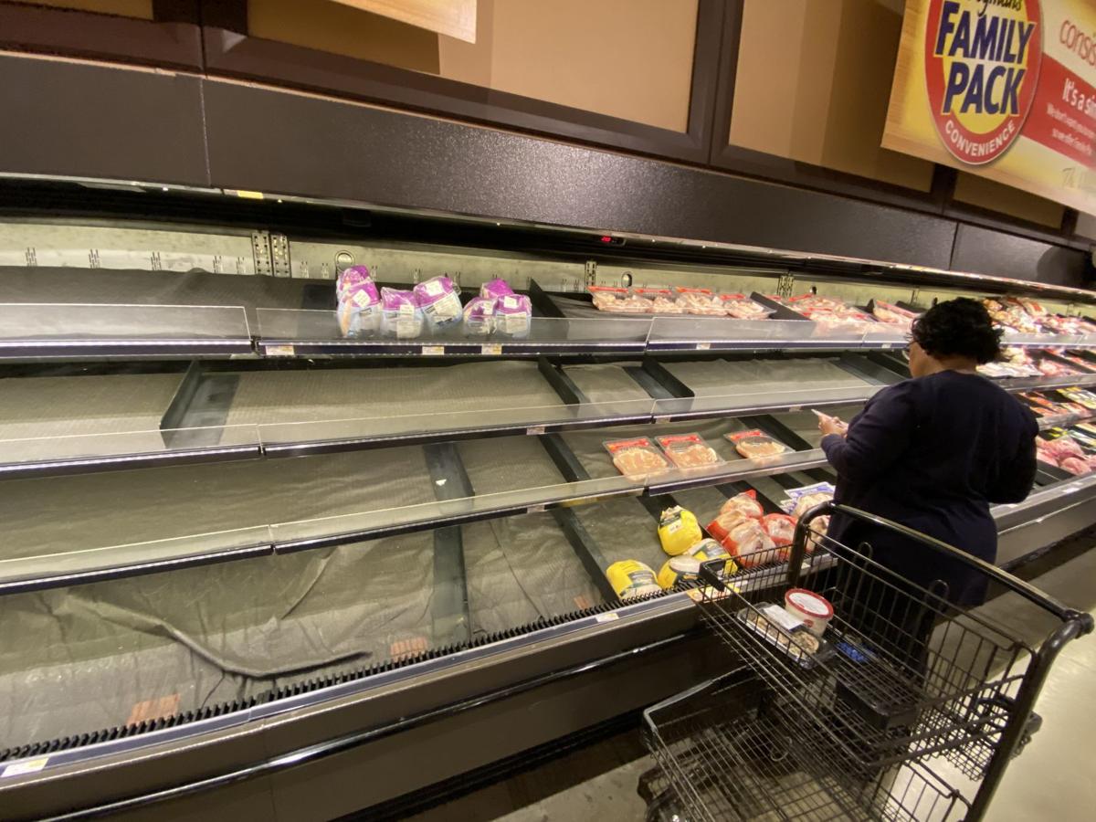 Photos Coronavirus Fears Causing Empty Shelves Long Lines At