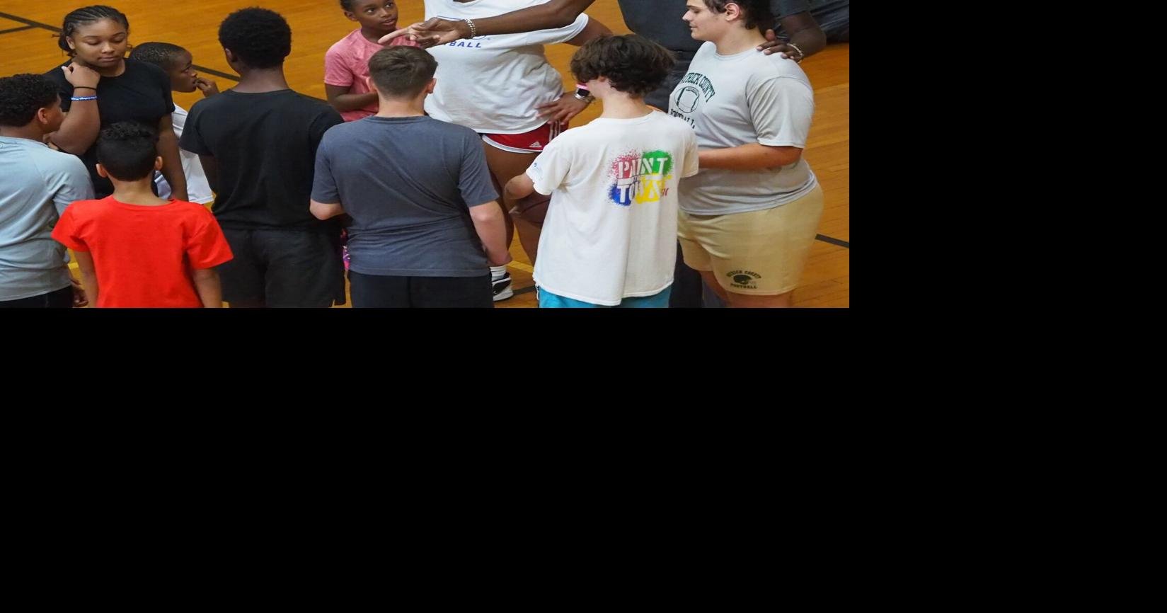 Famous Harlem Globetrotter to coach children in Martinsville