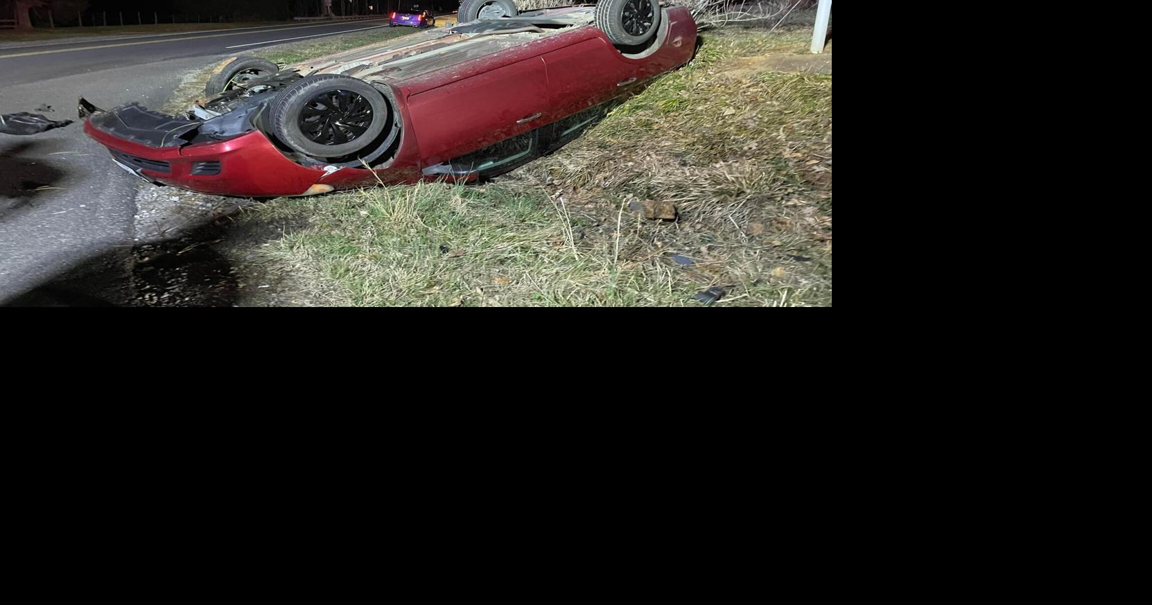 Driver walks away from overturned car