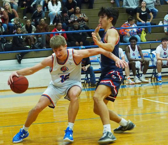 High School Boys Basketball Shooting, play in paint helps Bassett to