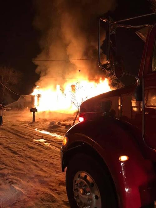 Firefighters extinguish structure fire