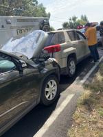 Five car collision injures two people