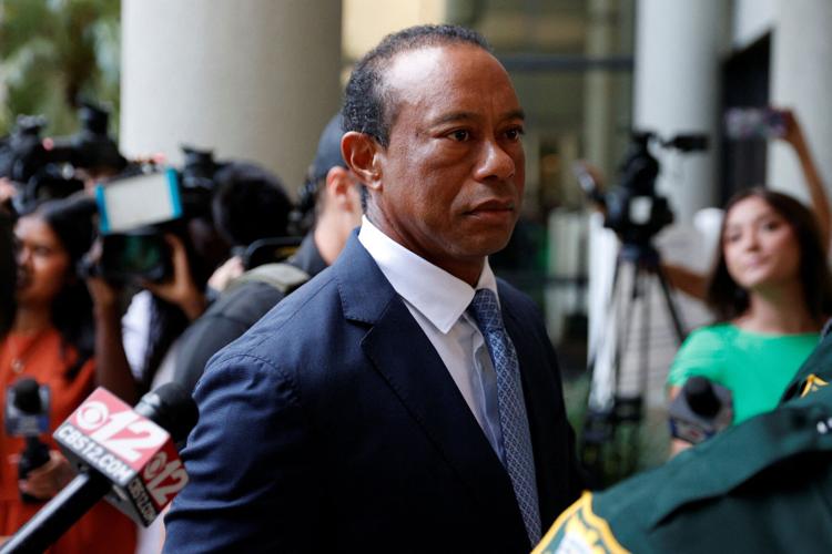 Golfer Tiger Woods walks outside the courthouse where he is scheduled to appear before a judge in person for the first time since his March 27 car accident, when he was arrested on a misdemeanor driving under the influence (DUI) charge after a rollover crash, in Stuart, Florida, U.S., September 2, 2026. REUTERS/Marco Bello