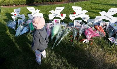 Police barricades are gone from Jefferson Avenue Tops, but grief, sadness and memorials remain