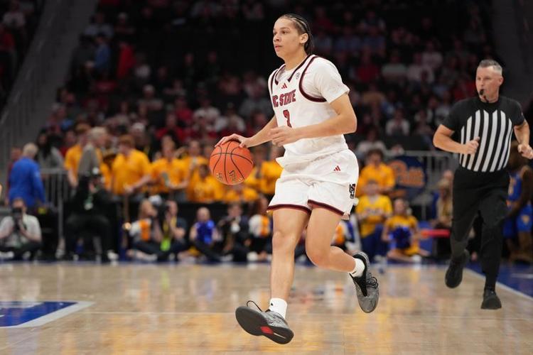 Mar 11, 2026; Charlotte, NC, USA; NC State Wolfpack guard Matt Able (3) brings the ball up the court in the second half at Spectrum Center. Mandatory Credit: Bob Donnan-Imagn Images