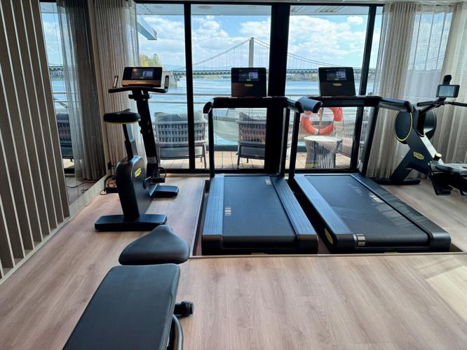 The Retreat is a wellness-focused area of the ship that features an expanded fitness facility and indoor-outdoor lounge space.