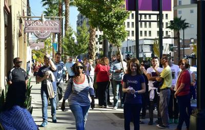Supporters of Hillary Clinton wait in line to enter Vroman's Bookstore in Pasadena, California on Dec. 1, 2017, to get a signed copy of Clinton's book "What Happened."