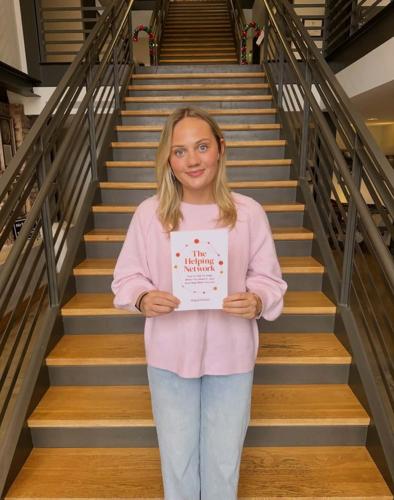 01xx26-hdr-news-girlscoutbook-p1