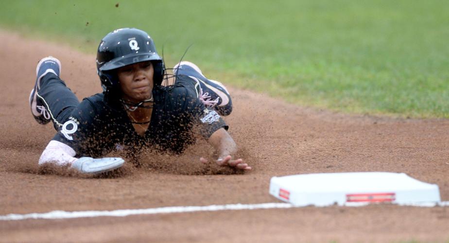 Los Angeles Queens Mo'ne Davis slides into third base during the game against the New York Heights at the season opener of the Women's Professional Baseball League at Roberts Stadium Saturday, August 1, 2026.