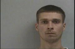 Second suspect charged in murder probe