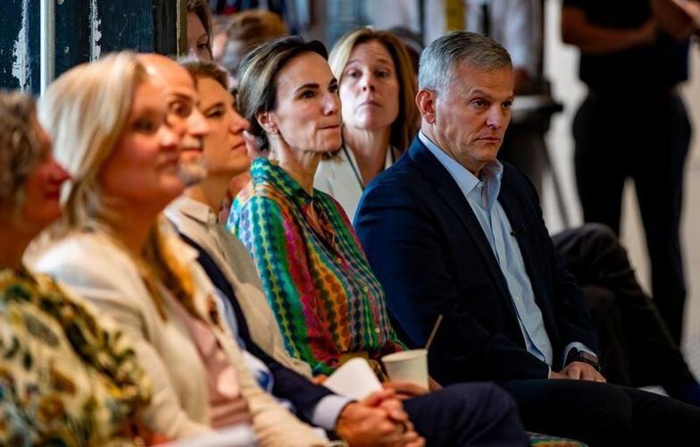 North Carolina Gov. Josh Stein and First Lady Anna Stein listen during the launch of the Craft Catalyst Initiative at the Center for Craft in Asheville on July 14, 2026.