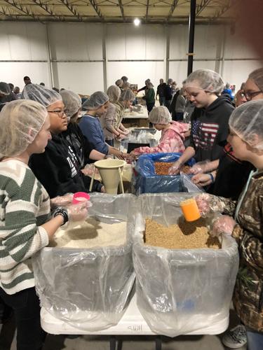 Organizer: Friday’s food-packing event was a big success
