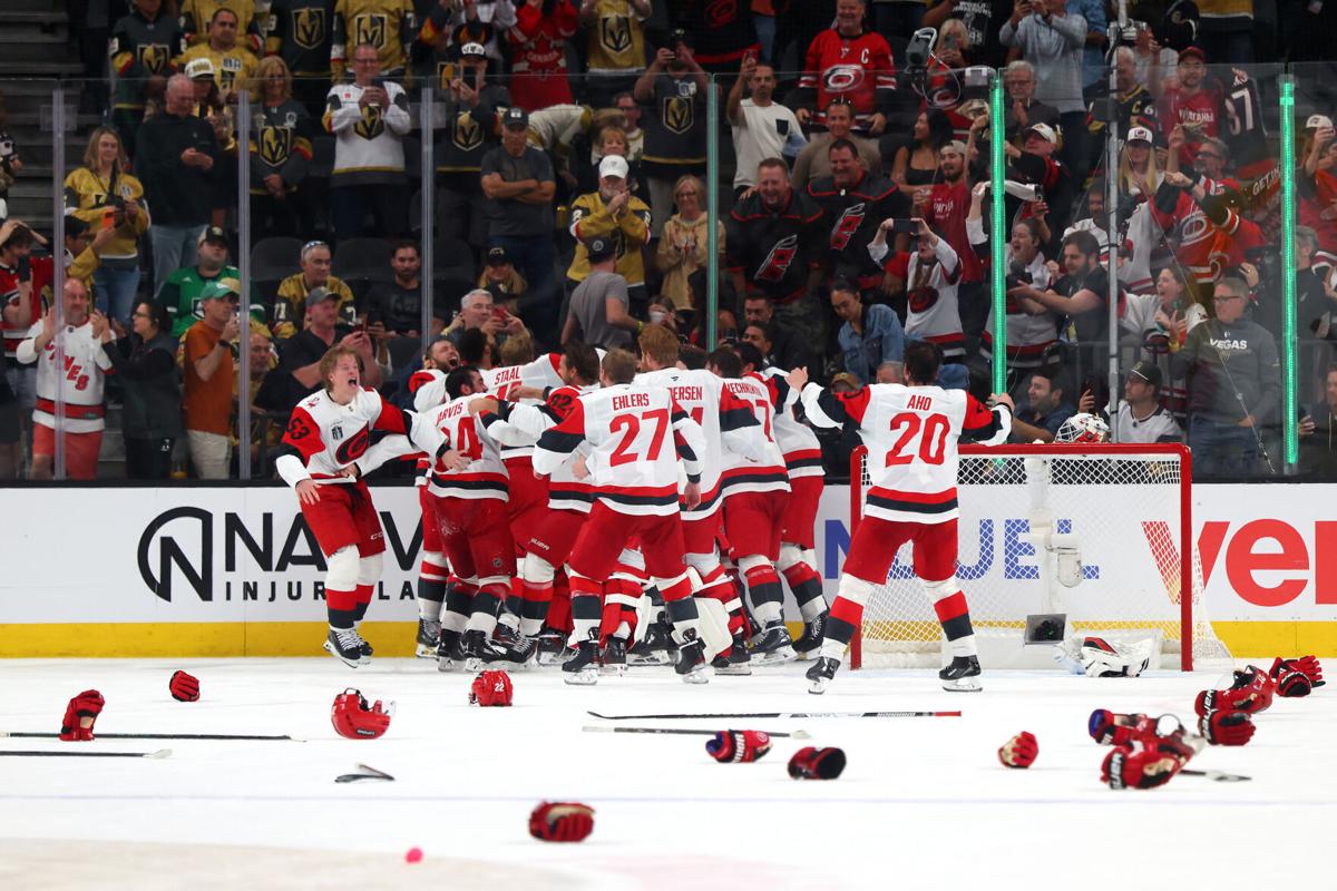 The Carolina Hurricanes celebrate winning Game 6 of the 2026 Stanley Cup Final against the Vegas Golden Knights 3-0 at T-Mobile Arena on Sunday, June 14, 2026, in Las Vegas.