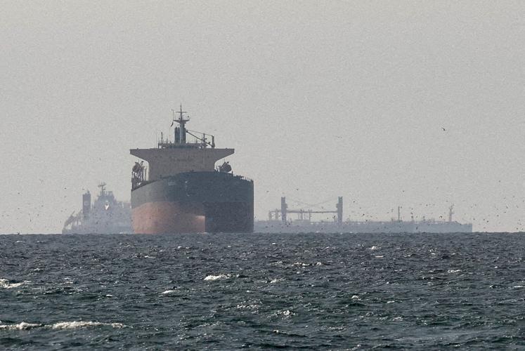 FILE PHOTO: Cargo ships in the Gulf, near the Strait of Hormuz (copy)