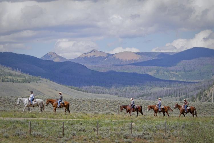 C Lazy U Ranch pairs luxury all-inclusive with a full-day Working Cattle Ranch Experience across 8,500 acres, including cattle sorting clinics and a trail picnic lunch.