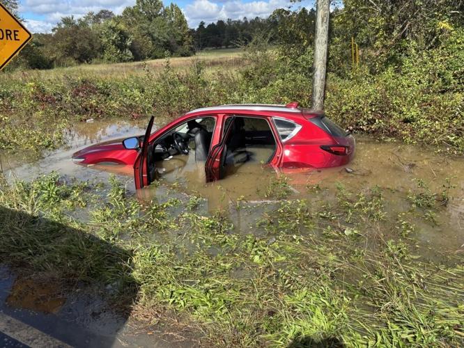 MNH 101126 Flooded car.jpg