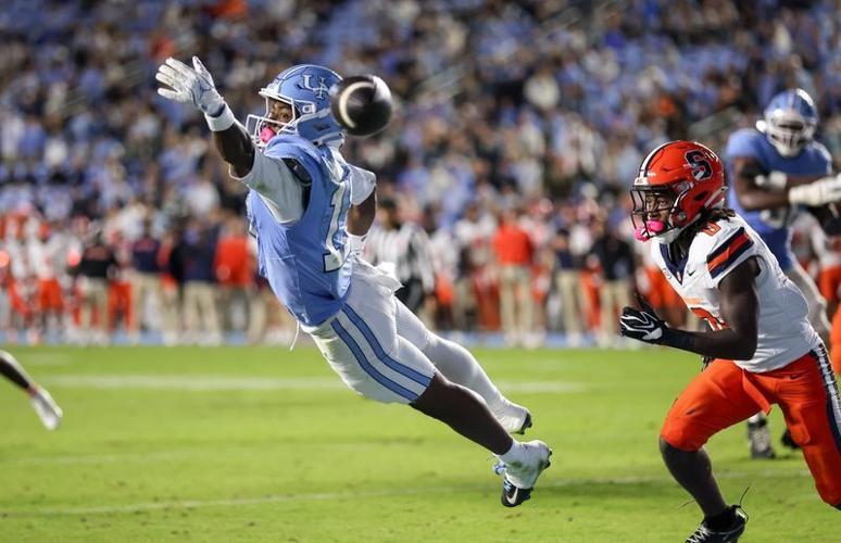 Oct 24, 2026; Chapel Hill, North Carolina, USA;  North Carolina Tar Heels wide receiver Nyqir Helton (17) misses a catch during the fourth quarter against Syracuse Orange at Kenan Stadium.  Mandatory Credit: Cory Knowlton-Imagn Images