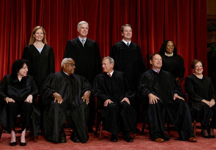 FILE PHOTO: U.S. Supreme Court justices pose for their group portrait at the Supreme Court in Washington