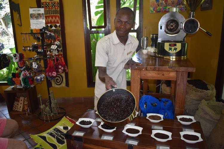 Freshly roasted beans complete the journey from plantation to cup during a coffee demonstration at Arusha Coffee Lodge in Tanzania.