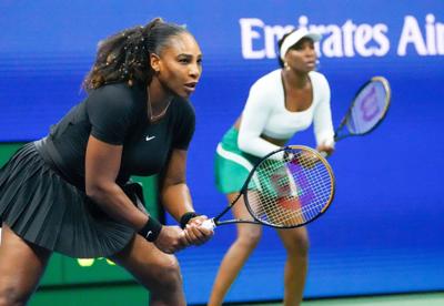 Serena Williams and Venus Williams of the USA play Lucie Hradecka and Linda Noskova of the Czech Republic in in women's doubles on day four of the 2022 U.S. Open tennis tournament at USTA Billie Jean King National Tennis Center.