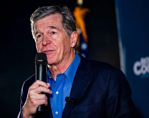 Former North Carolina Gov. Roy Cooper speaks during a “Make Stuff Cost Less” event at Oklawaha Brewing Company in Hendersonville on Aug. 20, 2026.