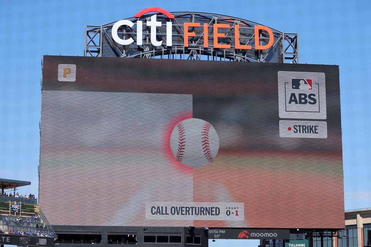 An overturned call displayed on the scoreboard at Citi Field.