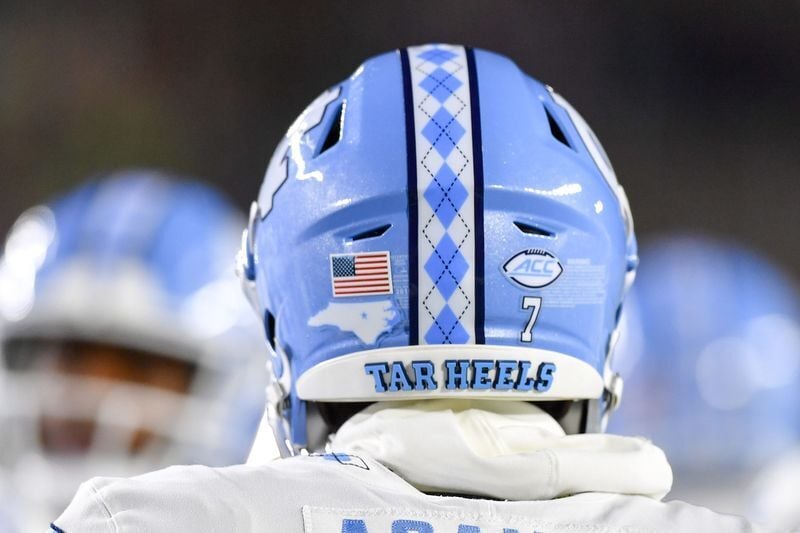 Oct 30, 2021; South Bend, Indiana, USA; A detail view of a North Carolina Tar Heels football helmet during warmups before the game against the Notre Dame Fighting Irish at Notre Dame Stadium. Mandatory Credit: Matt Cashore-USA TODAY Sports