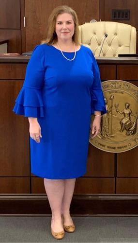 McEntire takes the oath as new District Court judge