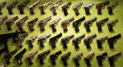 US-NEWS-GUNS-VIOLENCE-SURVEY-DMT