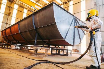 How does surface preparation impact coating adhesion?