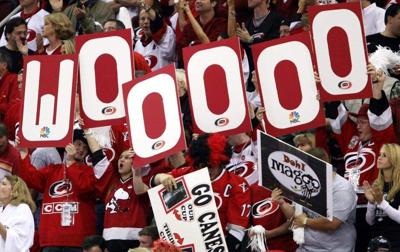 Carolina fans cheer on the Hurricanes as they take the ice against Edmonton in game 5 of the Stanley Cup Final on Wednesday, June 14, 2006 at the RBC Center.
