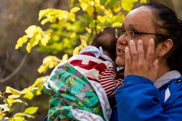 Julie Haukaas holding son