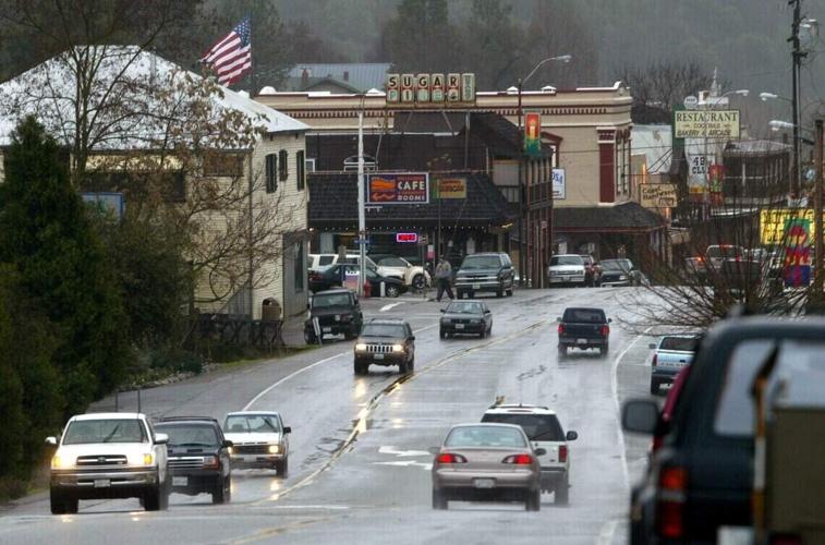 Traffic passes through central Mariposa, California along Highway 140 on Thursday, Dec 30, 2004.