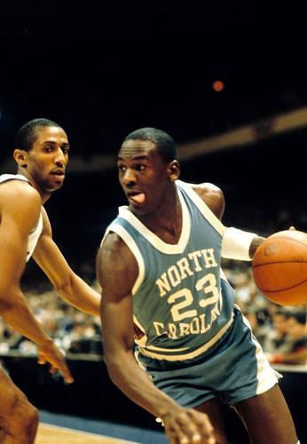 Mar 10, 1984; Greensboro, NC, USA; FILE PHOTO; North Carolina Tar Heels guard Michael Jordan (23) in action against Duke Blue Devils guard Tommy Amaker (4) during the ACC tournament at Greensboro Coliseum. Duke defeated North Carolina 77-75. Mandatory C...