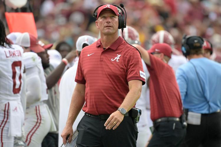 Alabama coach Kalen DeBoer watches his team's game against Florida State during the second half at Doak S. Campbell Stadium.