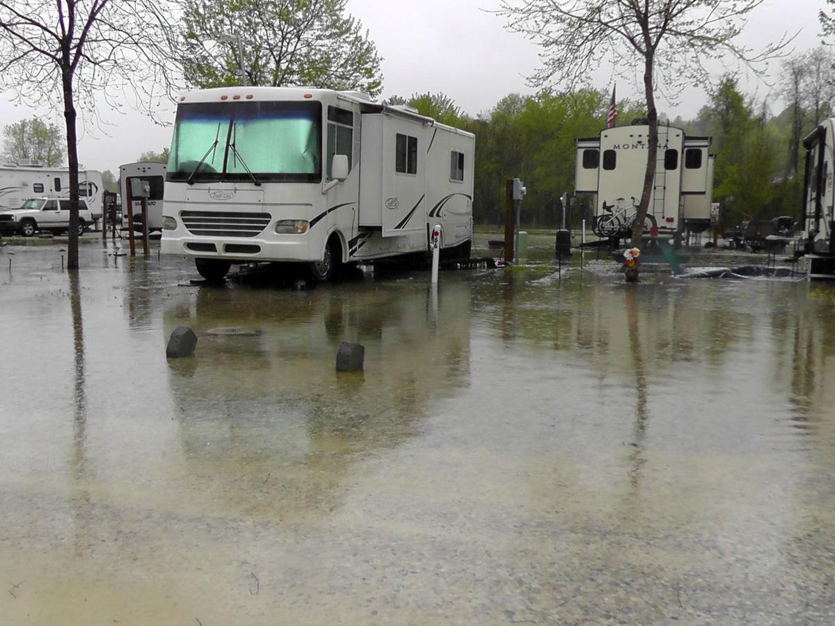 Heavy rains bring flooding Elevated waters drench campground, greenway