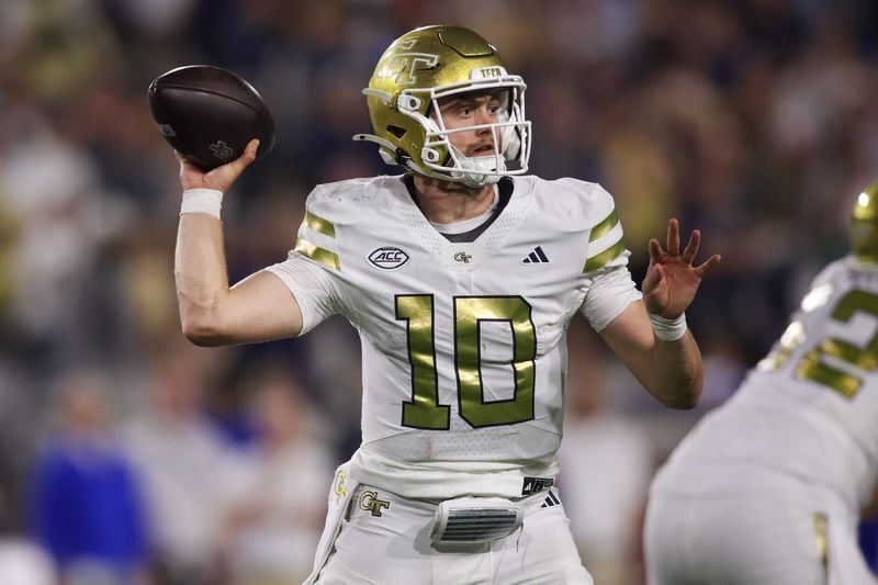 Nov 22, 2025; Atlanta, Georgia, USA; Georgia Tech Yellow Jackets quarterback Haynes King (10) throws a pass against the Pittsburgh Panthers in the third quarter at Bobby Dodd Stadium at Hyundai Field. Mandatory Credit: Brett Davis-Imagn Images