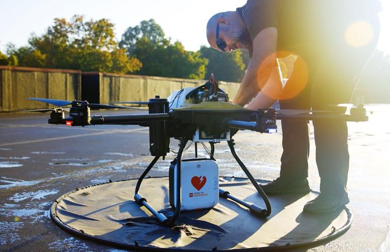 Forsyth County Sheriff's Office pilot sets up drone to deliver AED
