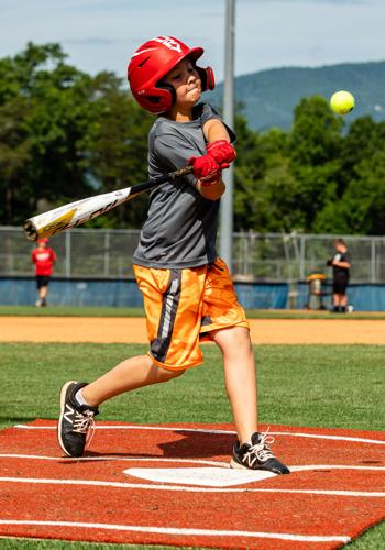 Camping out: Conference champion Titans host annual youth baseball camp
