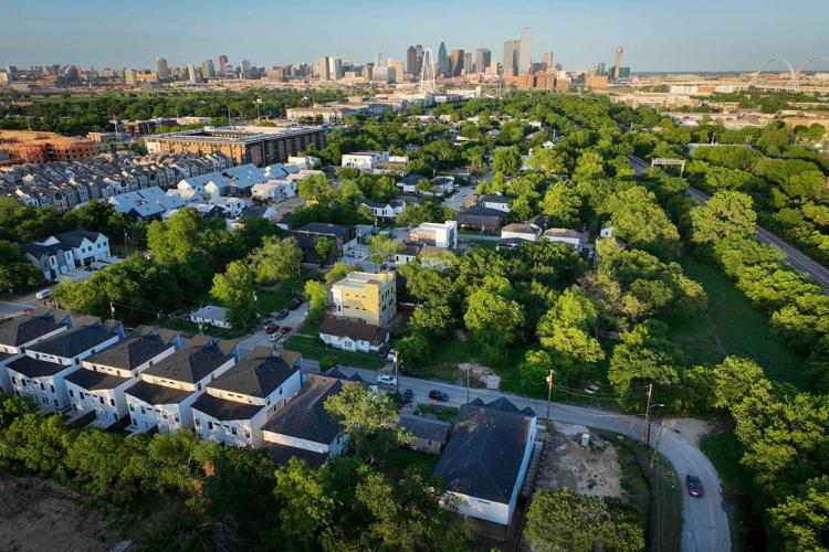 Aerial view of the Gilbert-Emory neighborhood looking toward the downtown skyline on Sunday, April 30, 2023, in Dallas.