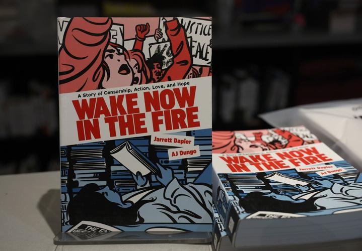 Librarian and author Jarrett Dapier's graphic novel, "Wake Now in the Fire," is on display at the register at The Book Cellar, 4736 N. Lincoln Ave., Tuesday, Feb. 3, 2026, in Chicago.