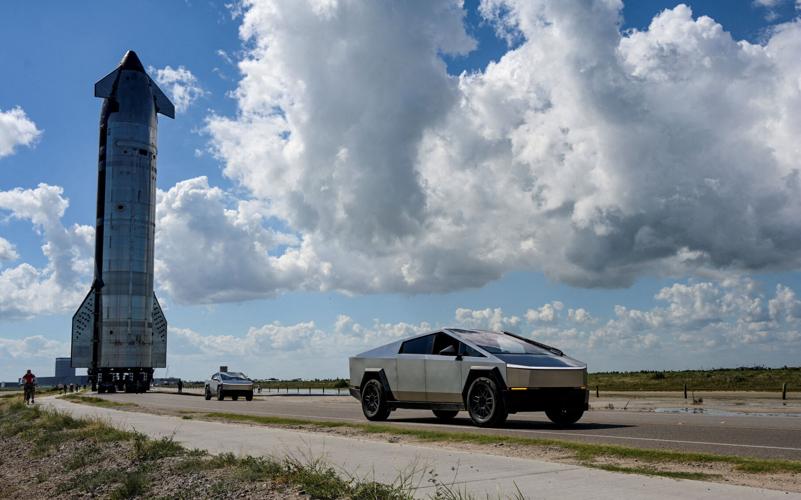 FILE PHOTO: Why would Musk merge SpaceX and Tesla?