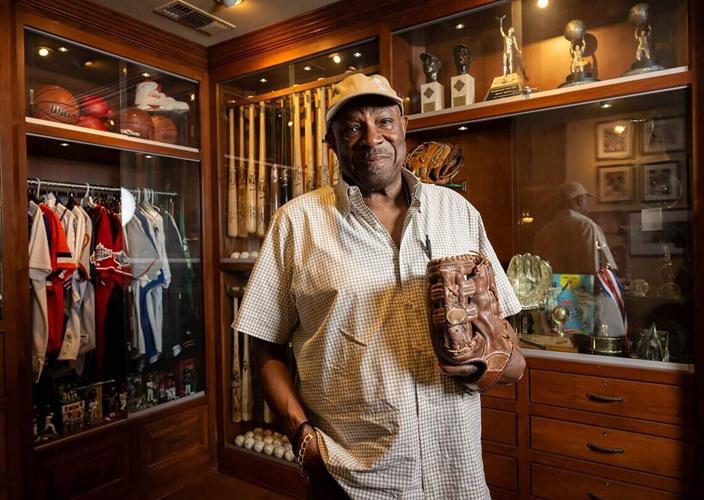 Dusty Baker wears the baseball glove he used during his playing career with the Los Angeles Dodgers, San Francisco Giants and Oakland Athletics at his Granite Bay home on Wednesday, June 3, 2026.