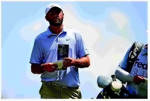 Scottie Scheffler hoisting the trophy after a massive Scheffler Win at Bay Hill