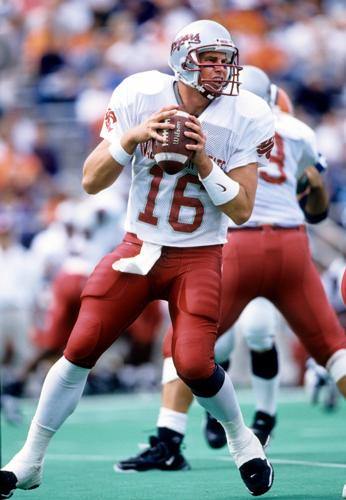 Washington State Cougars quarterback Ryan Leaf (16) in action against the Illinois Illini at Memorial Stadium.