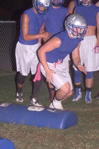 Moonlight madness: Titans kick off 2015 season with 12:01 practice