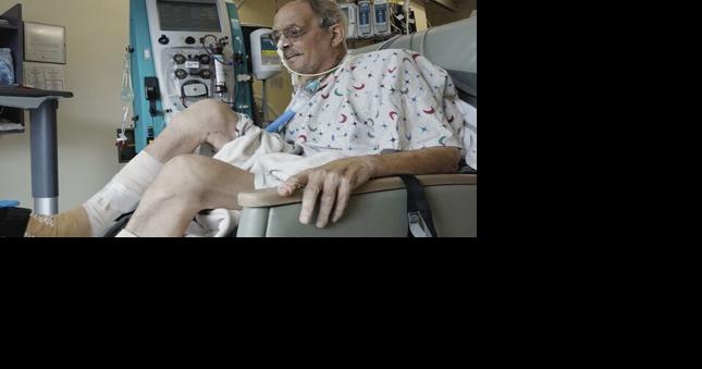 A month after pig heart transplant man works to regain strength with no rejection so far