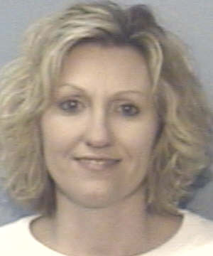 Woman accused of embezzling from Marion orthodontist surrenders